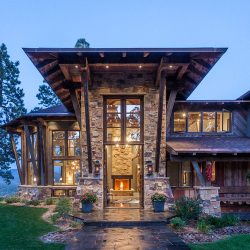 mountain modern diagonal wood siding exposed rafters stone