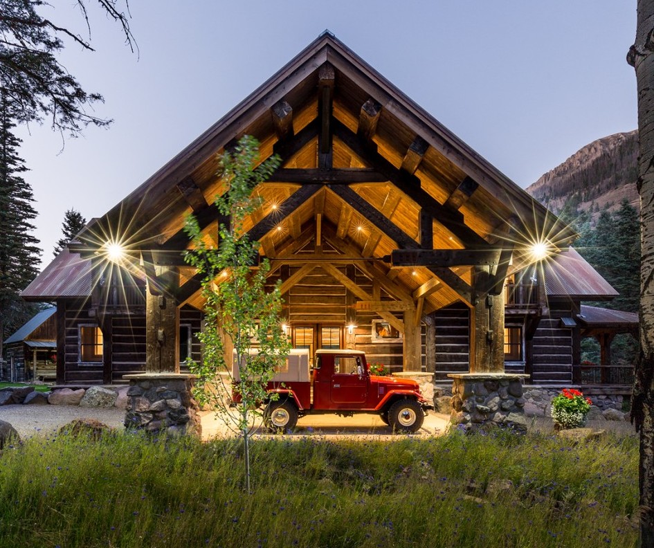 Cabin-Style Home with Large Wooden Porte Cochere